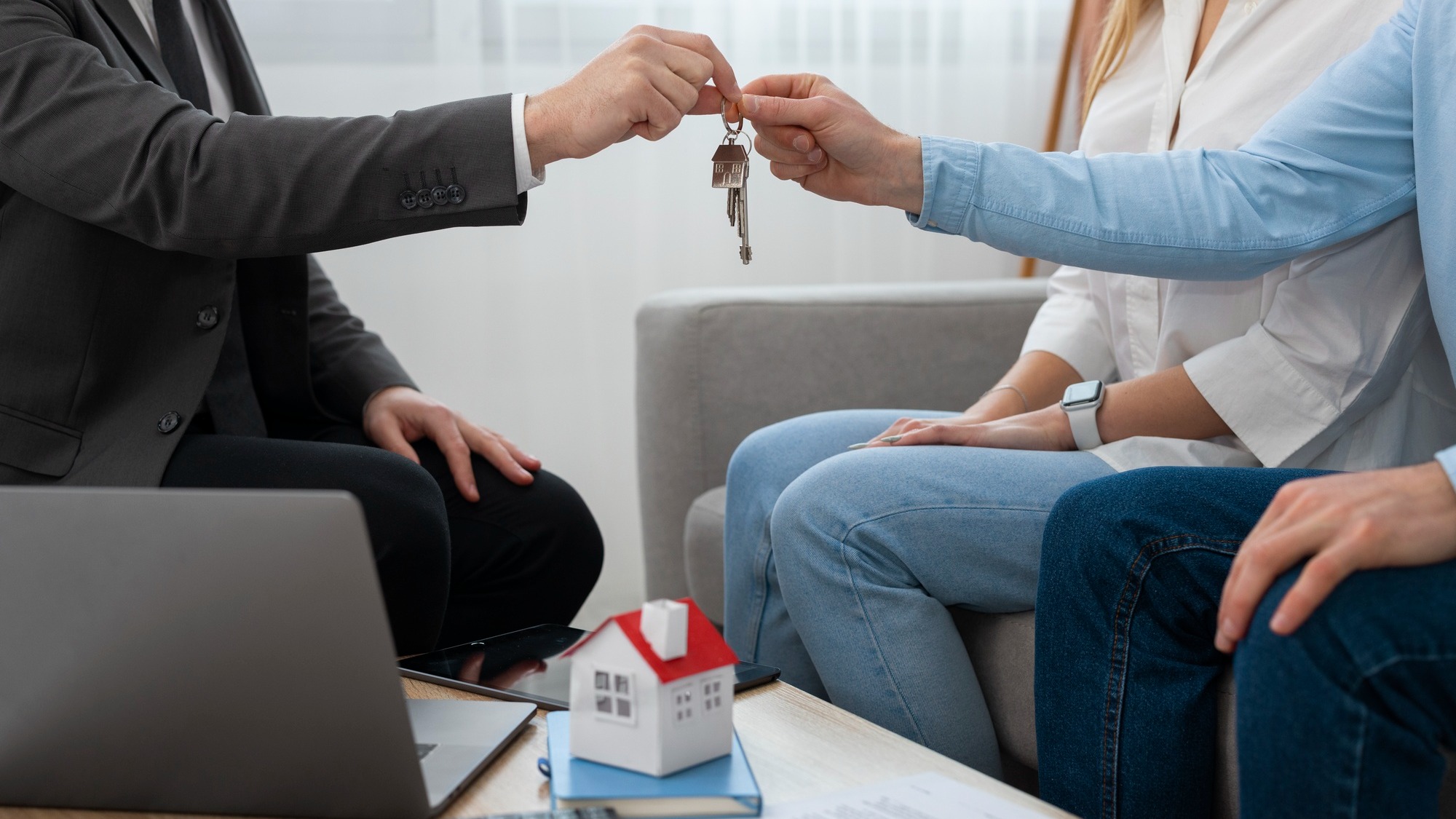 Real estate agent at work showing house and doing business