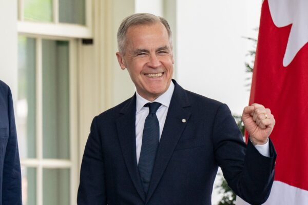 Donald Trump greets Prime Minister of Canada Mark Carney, Tuesday, May 6, 2025, at the West Wing entrance of the White House