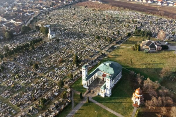 Drone view of the Catholic church and cemetery on the sunrise Sombor Serbia Europe