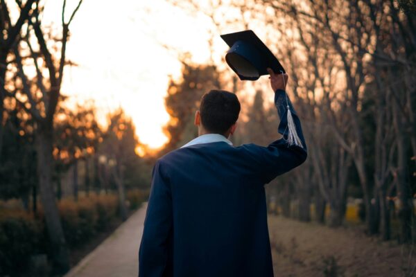 A graduate celebrates the end of their journey.