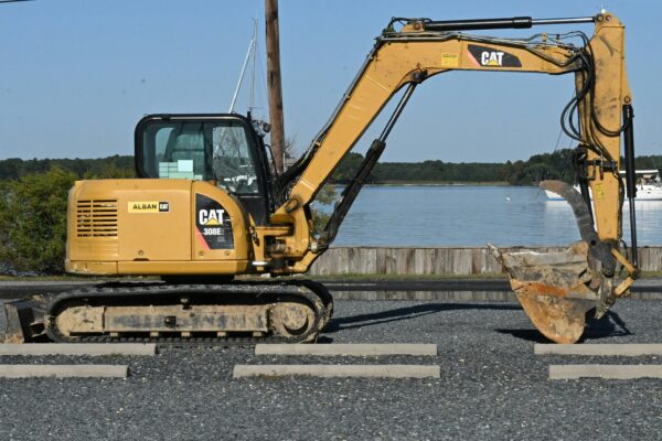 a yellow bulldozer on a dock