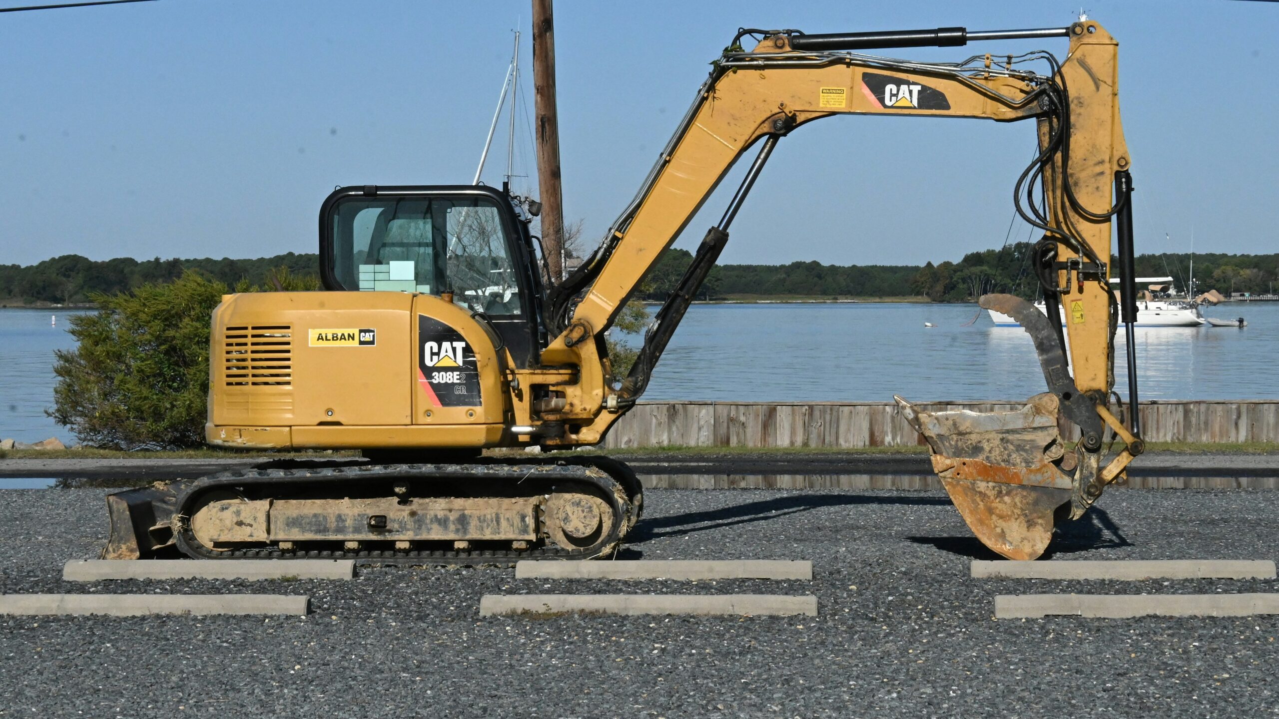 a yellow bulldozer on a dock