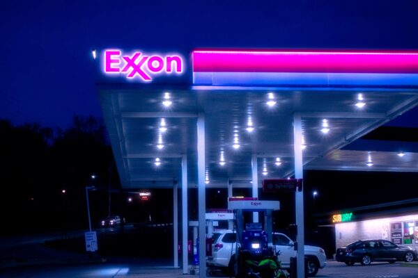cars parked in front of UNKs store during night time
