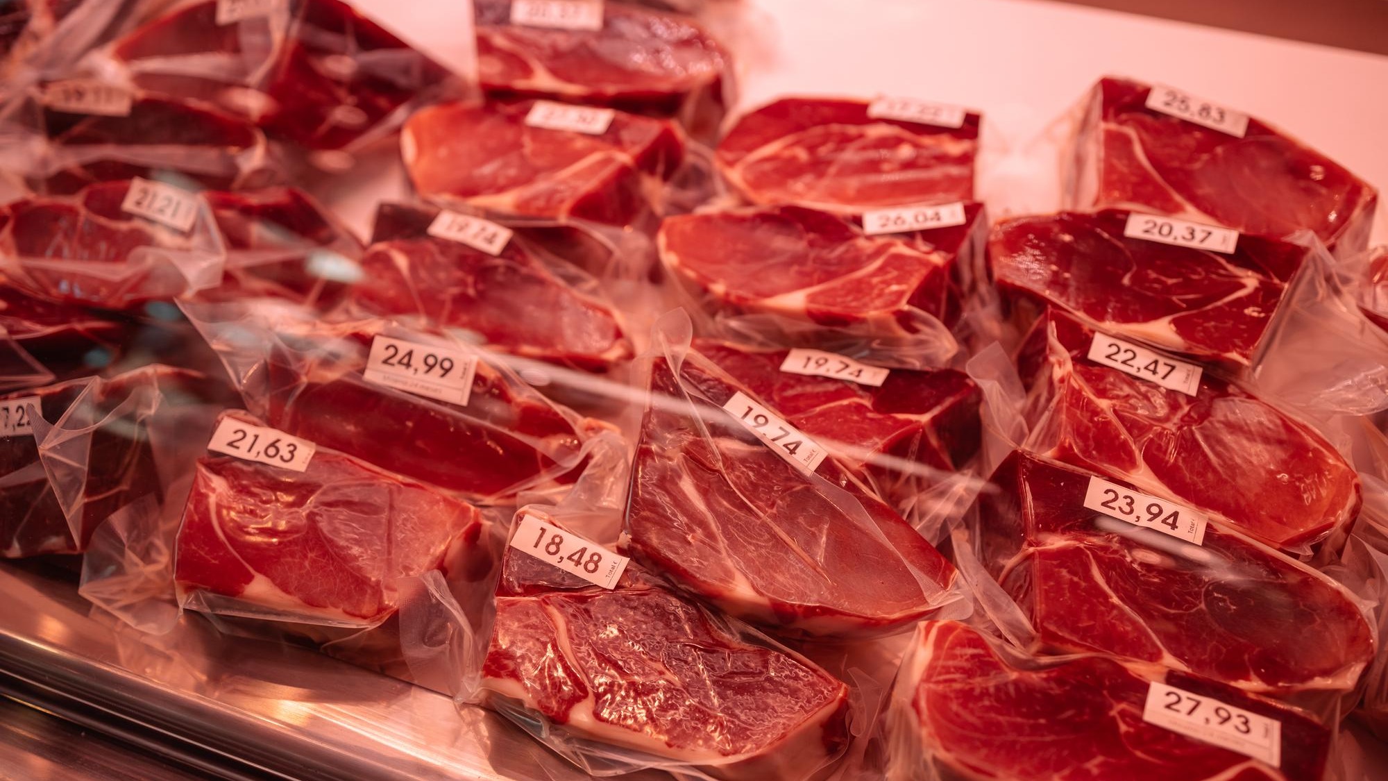 Vacuumpacked meat at La Boqueria market in Barcelona Spain