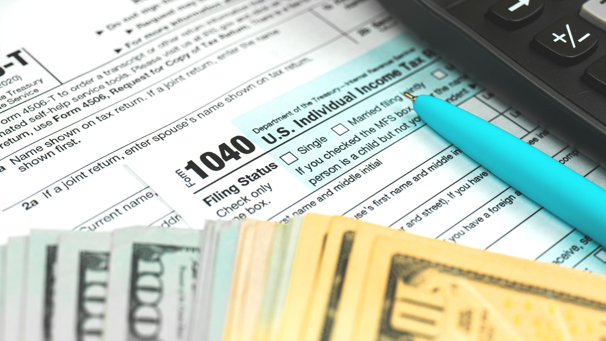 Tax form 1040 US American IRS Internal Revenue Service income tax background photo