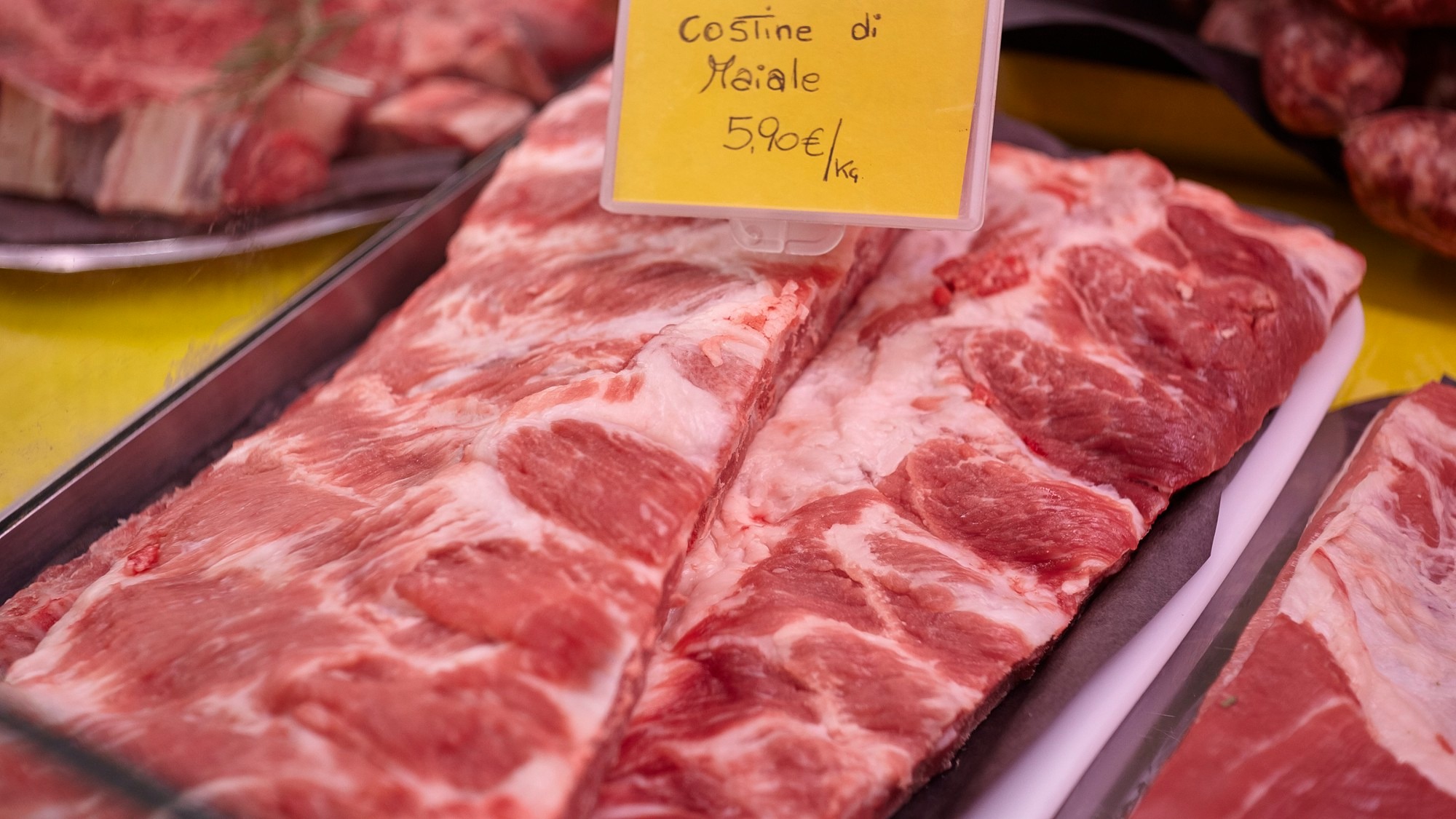 Various Meat cuts exposed in the butchery fridge counter