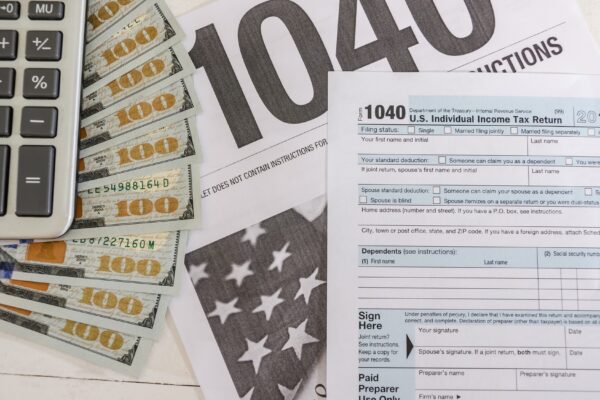 tax forms 1040 and dollars