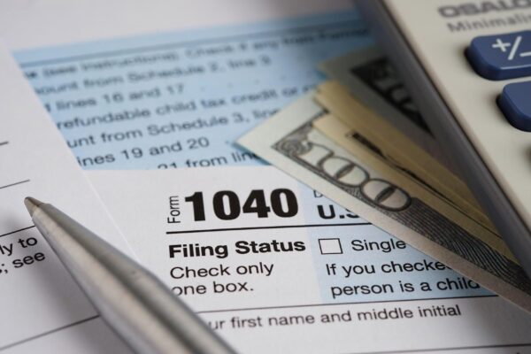 Tax form 1040 US Individual Income Tax Return business finance concept