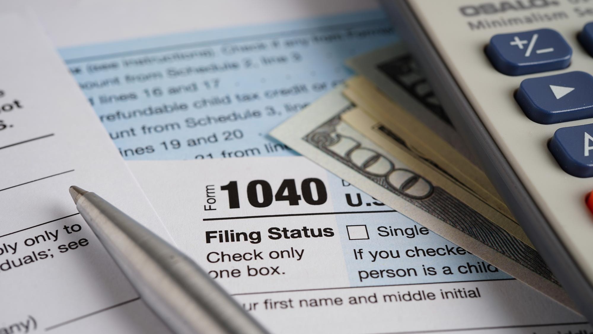 Tax form 1040 US Individual Income Tax Return business finance concept