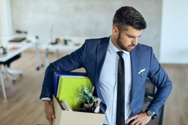 Fired businessman feeling worried about loosing his job
