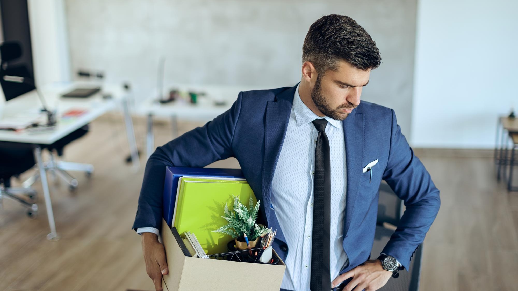 Fired businessman feeling worried about loosing his job
