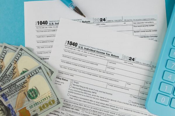 Tax form 1040 on a beautiful blue background financial document