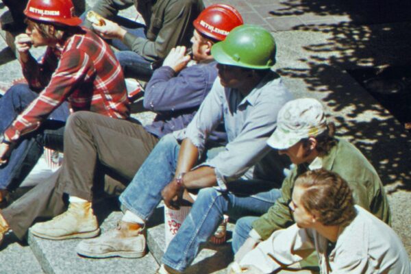 a group of men wearing helmets
