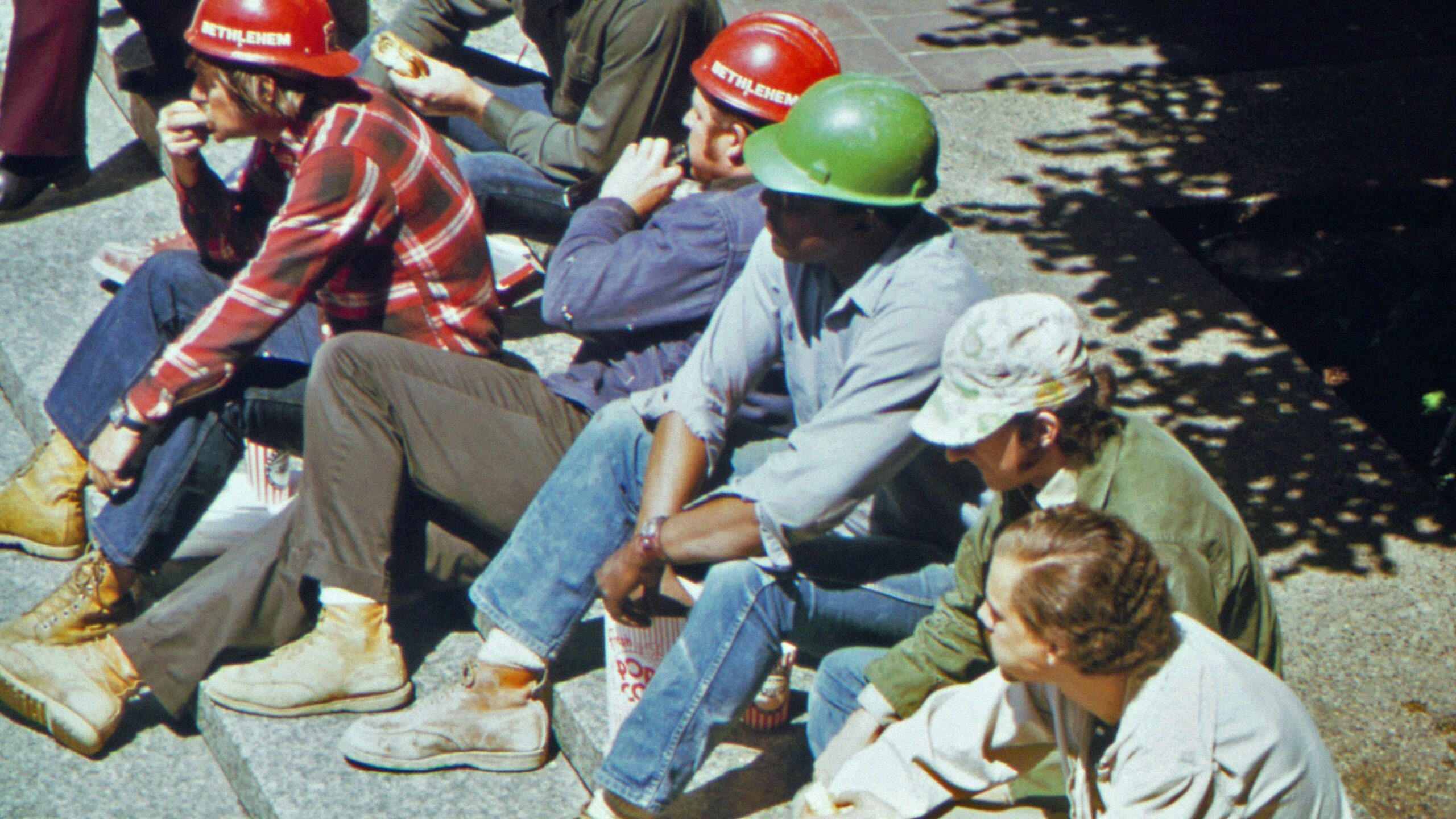a group of men wearing helmets