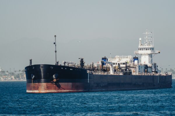 A large cargo ship in the middle of the ocean