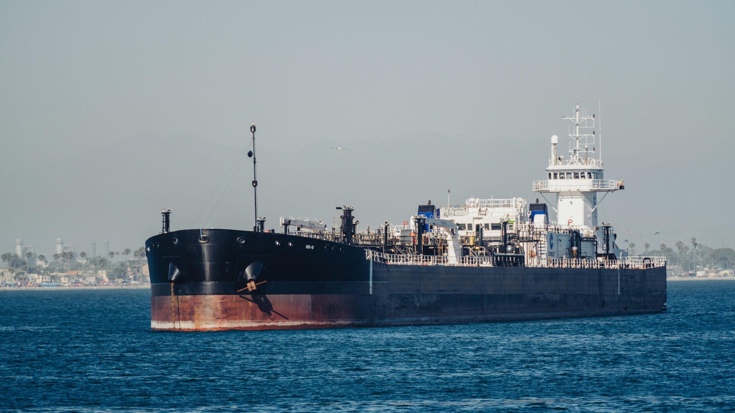 A large cargo ship in the middle of the ocean