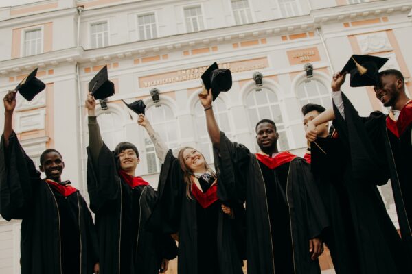 group of people wearing black academic dress