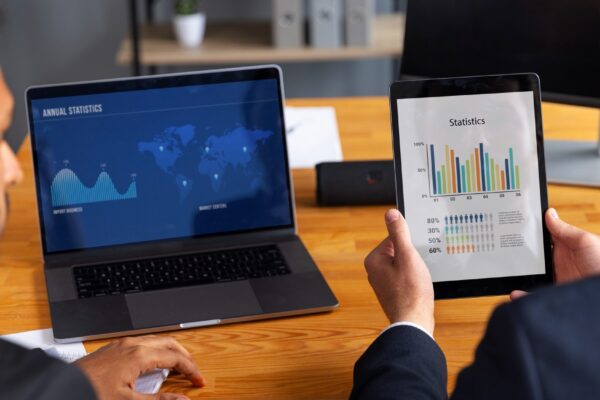 Business person looking at finance graphs