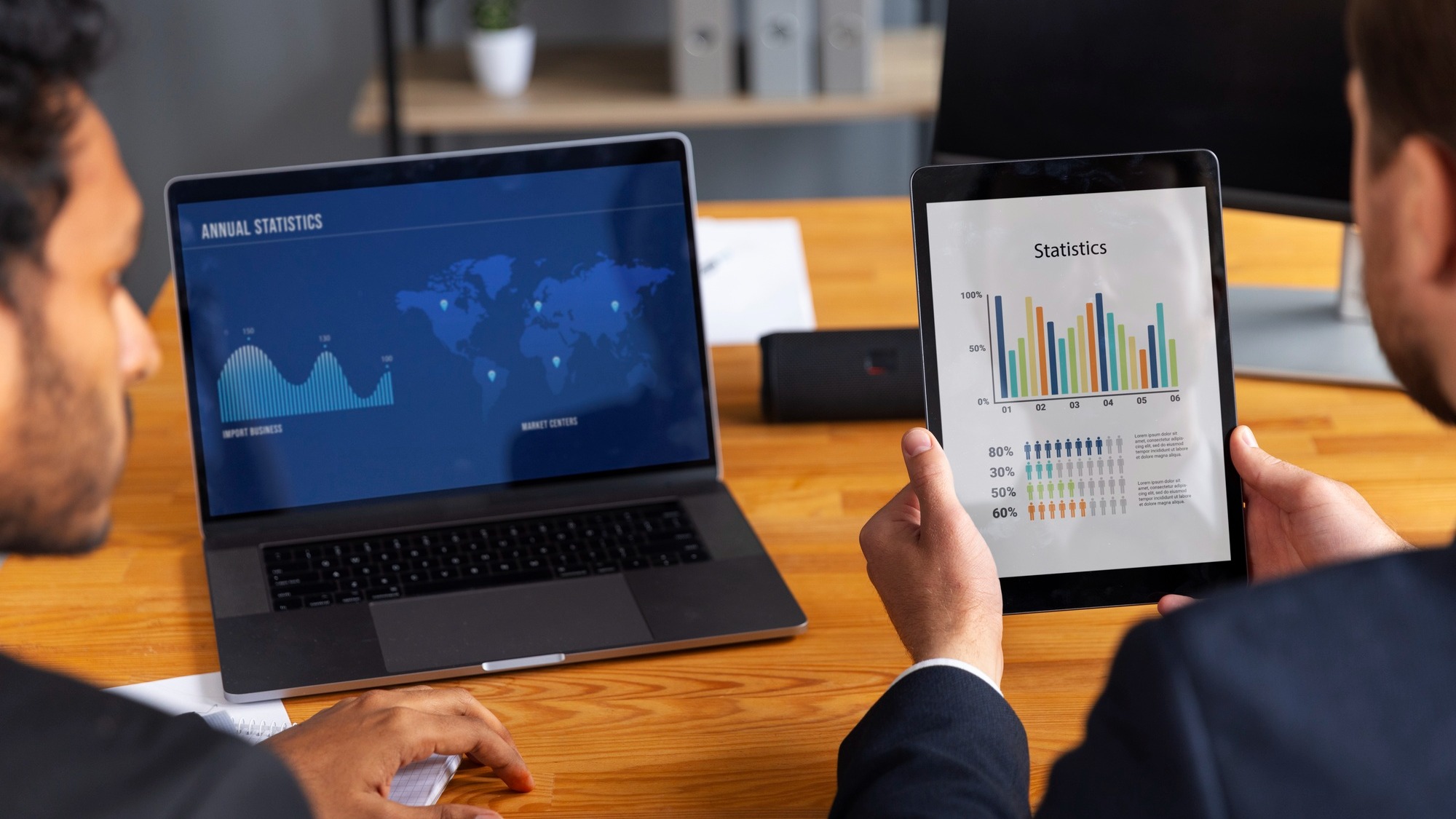 Business person looking at finance graphs