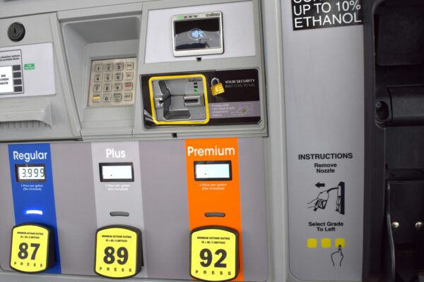 a close up of a gas pump with gas prices