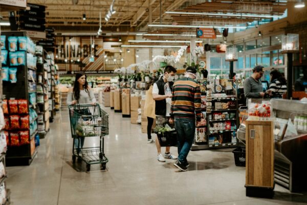 people walking on market during daytime