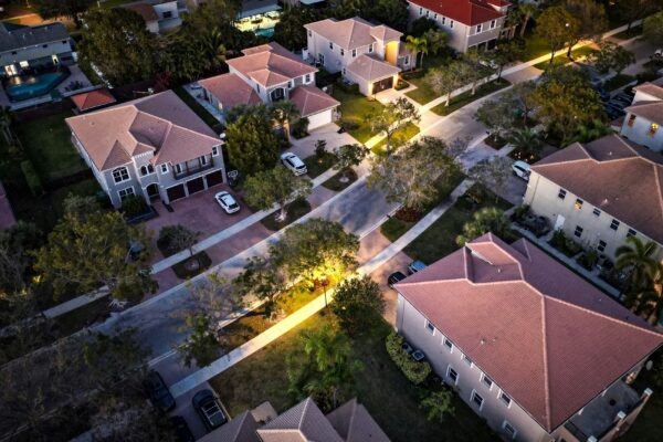 an aerial view of a neighborhood at night