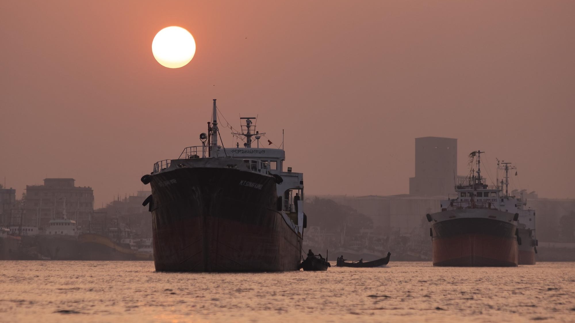 Port of Chittagong traditional cargo and fishing boats on the water