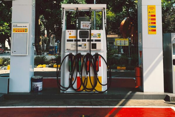 a gas station with a red carpet on the floor