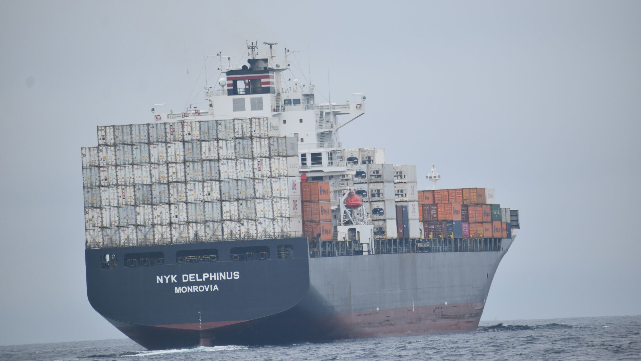 a large ship with containers on it