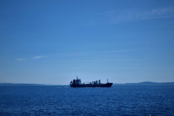 a large ship sailing across a large body of water