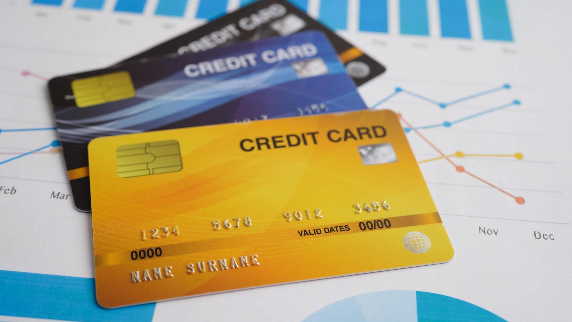 Credit card on graph paper for online shopping security finance business