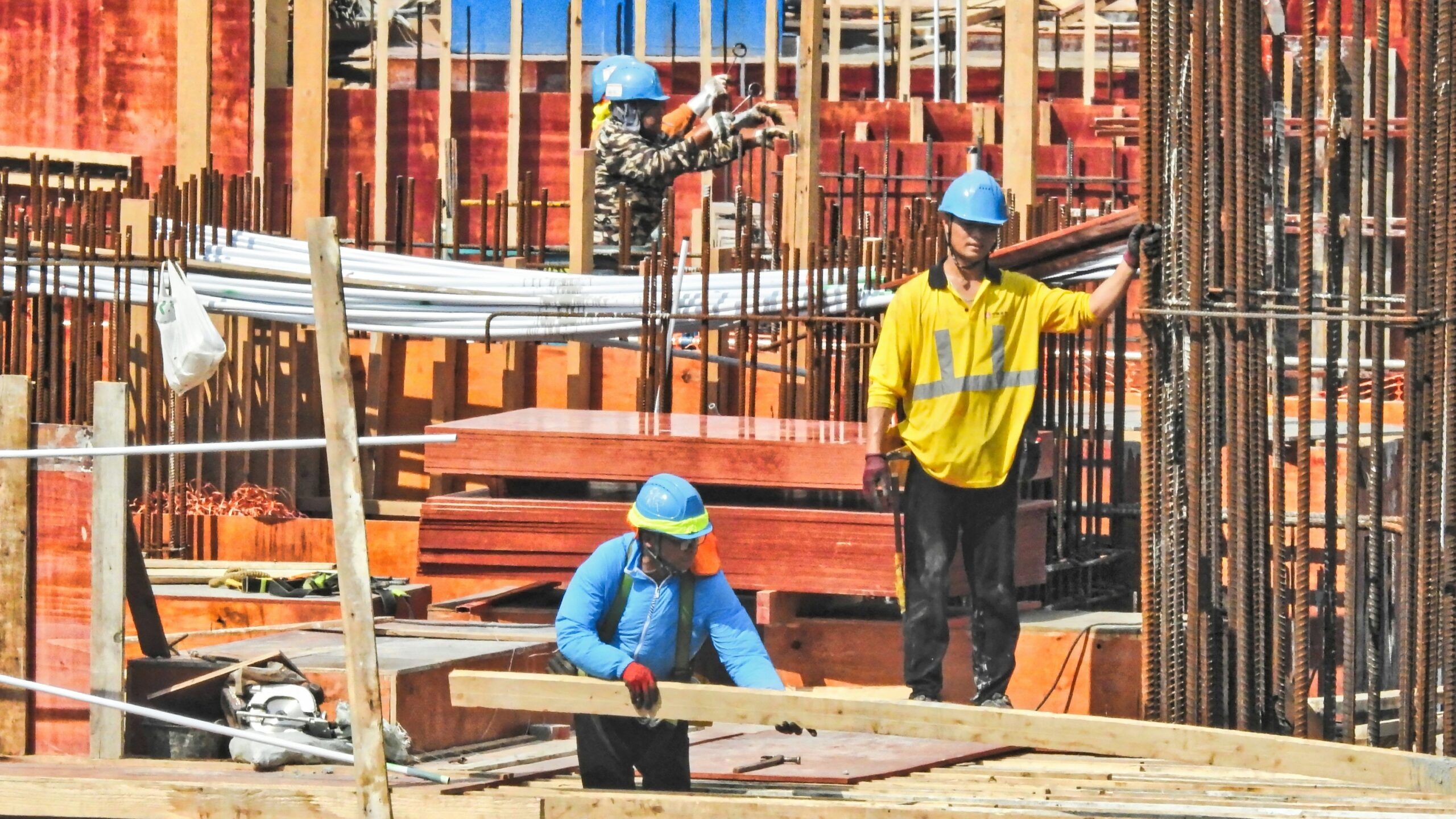 a group of men working on a construction site