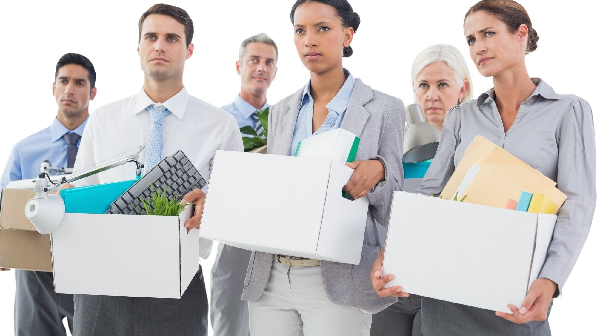 Employees carrying boxes after job loss