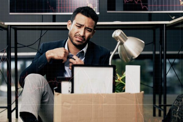 Businessman stress and unemployment in office with worry anxiety or sad for job loss Stock broker employee and mental health in market crash recession or financial crisis and retrenched on floor