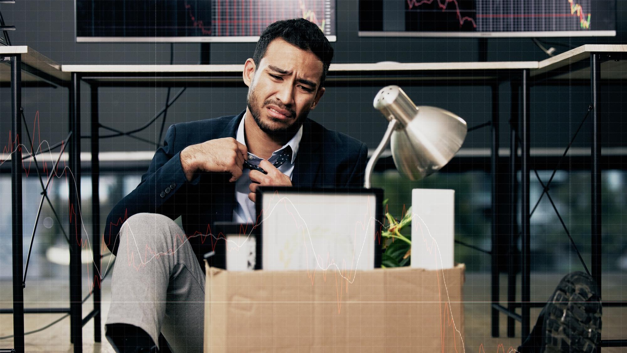 Businessman stress and unemployment in office with worry anxiety or sad for job loss Stock broker employee and mental health in market crash recession or financial crisis and retrenched on floor