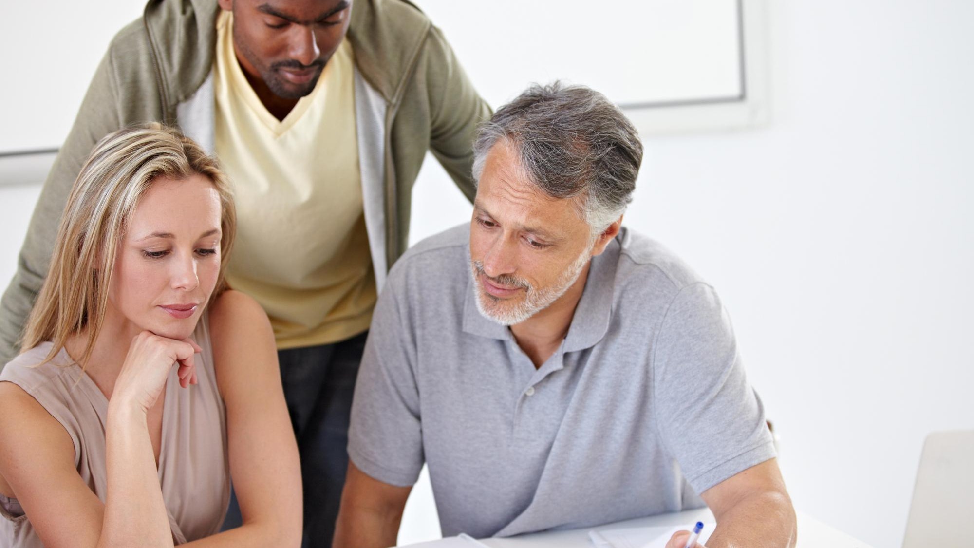 Coworkers creative and brainstorming or paperwork for project proposal at agency for problem solving solution or idea People diversity and discussion in boardroom or planning meeting or support