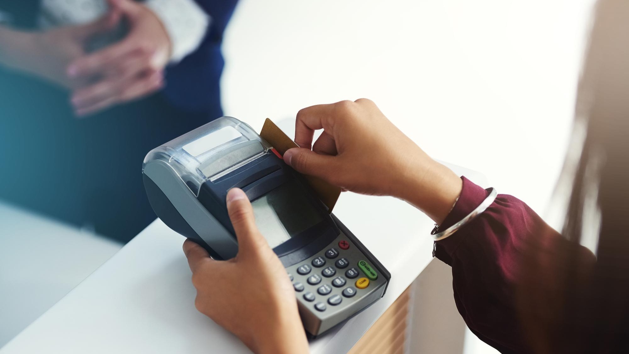 Credit card payment swipe or hands of person in mall with pos machine in a financial exchange B2c fintech sales services or closeup of customer paying swiping or shopping in retail store trade