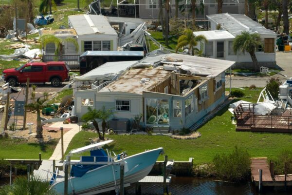 View from abover of damaged mobile homes after hurricane Ian in Florida residential area Consequences of natural disaster
