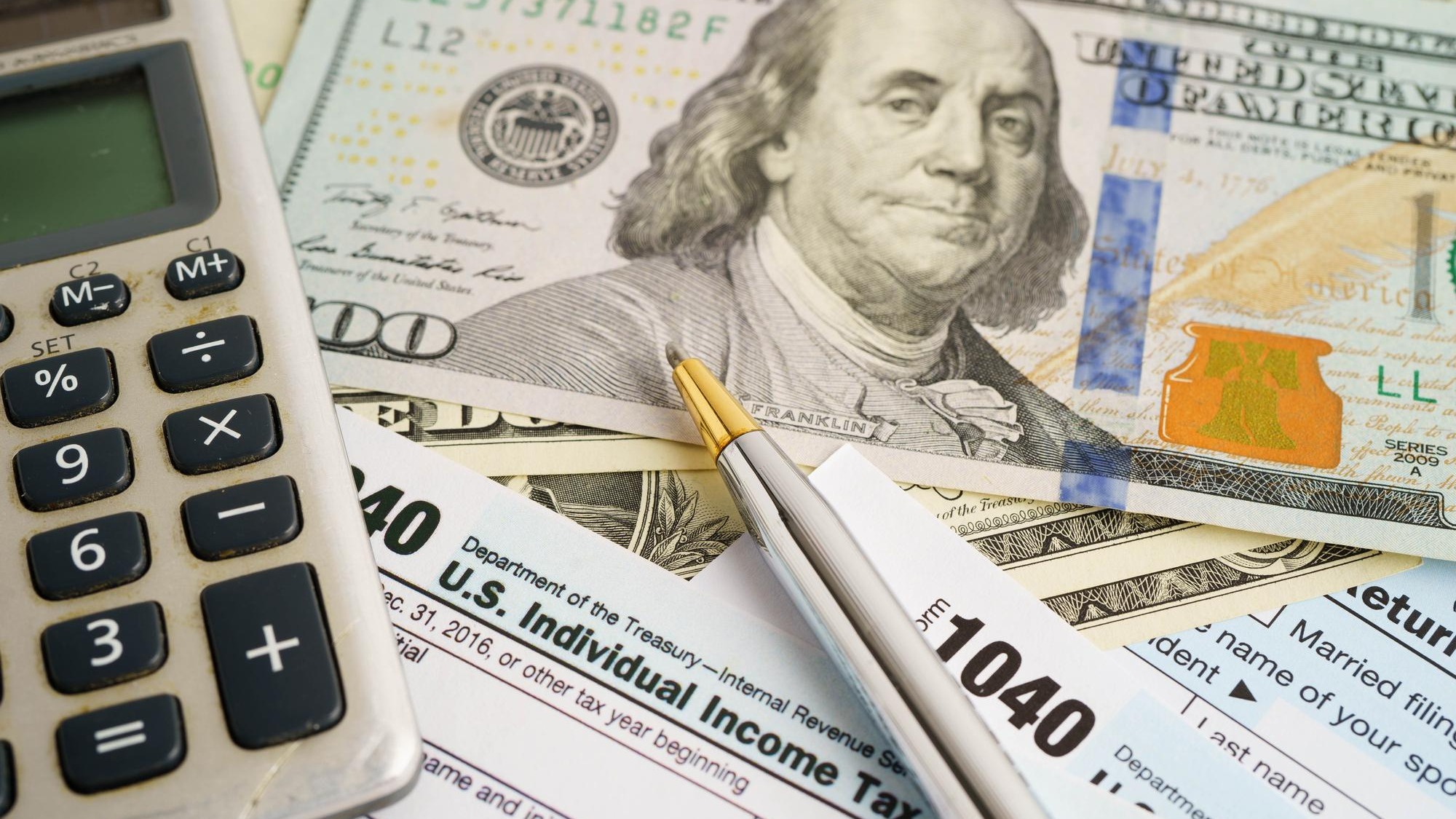 Tax form 1040 US Individual Income Tax Return business finance concept