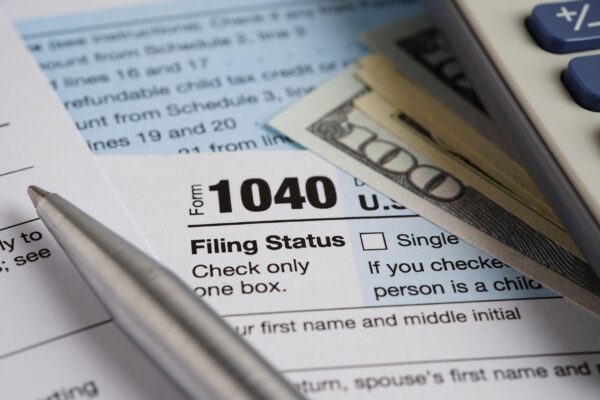 Tax form 1040 US Individual Income Tax Return business finance concept