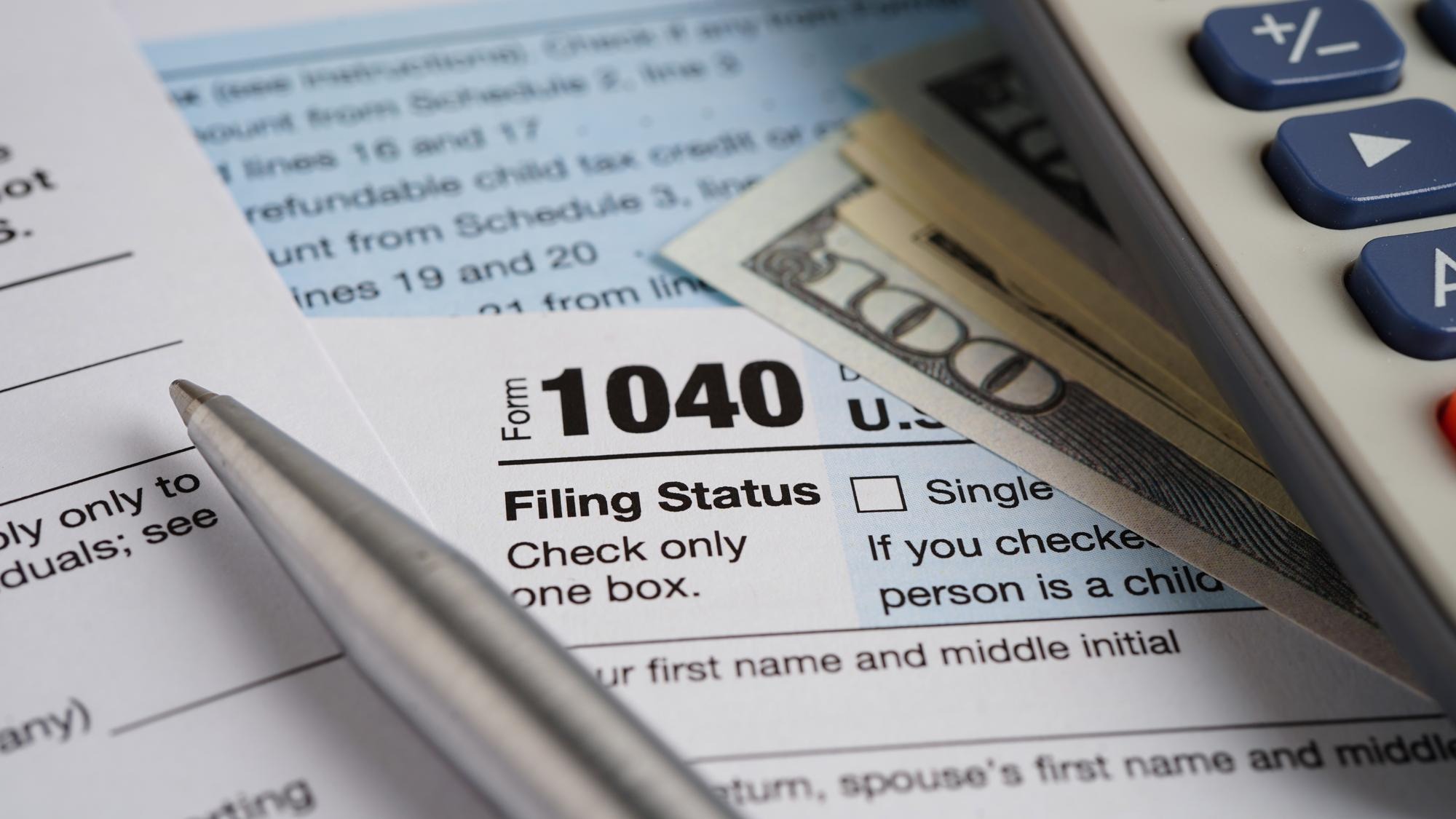 Tax form 1040 US Individual Income Tax Return business finance concept