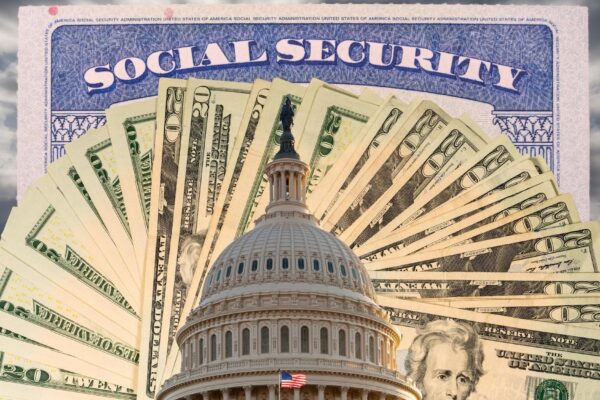 US Congress and Capitol in Washington DC with cash and social security card to illustrate budget problems as a result of coronavirus
