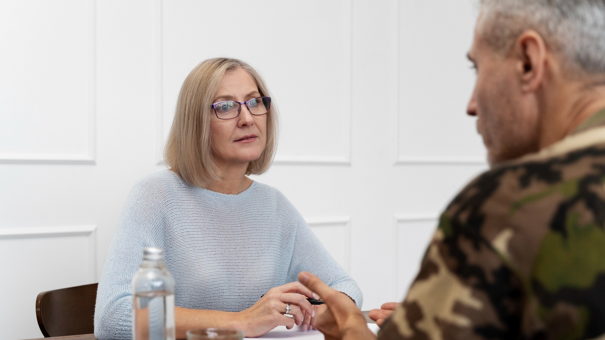 Person suffering from ptsd at psychologist