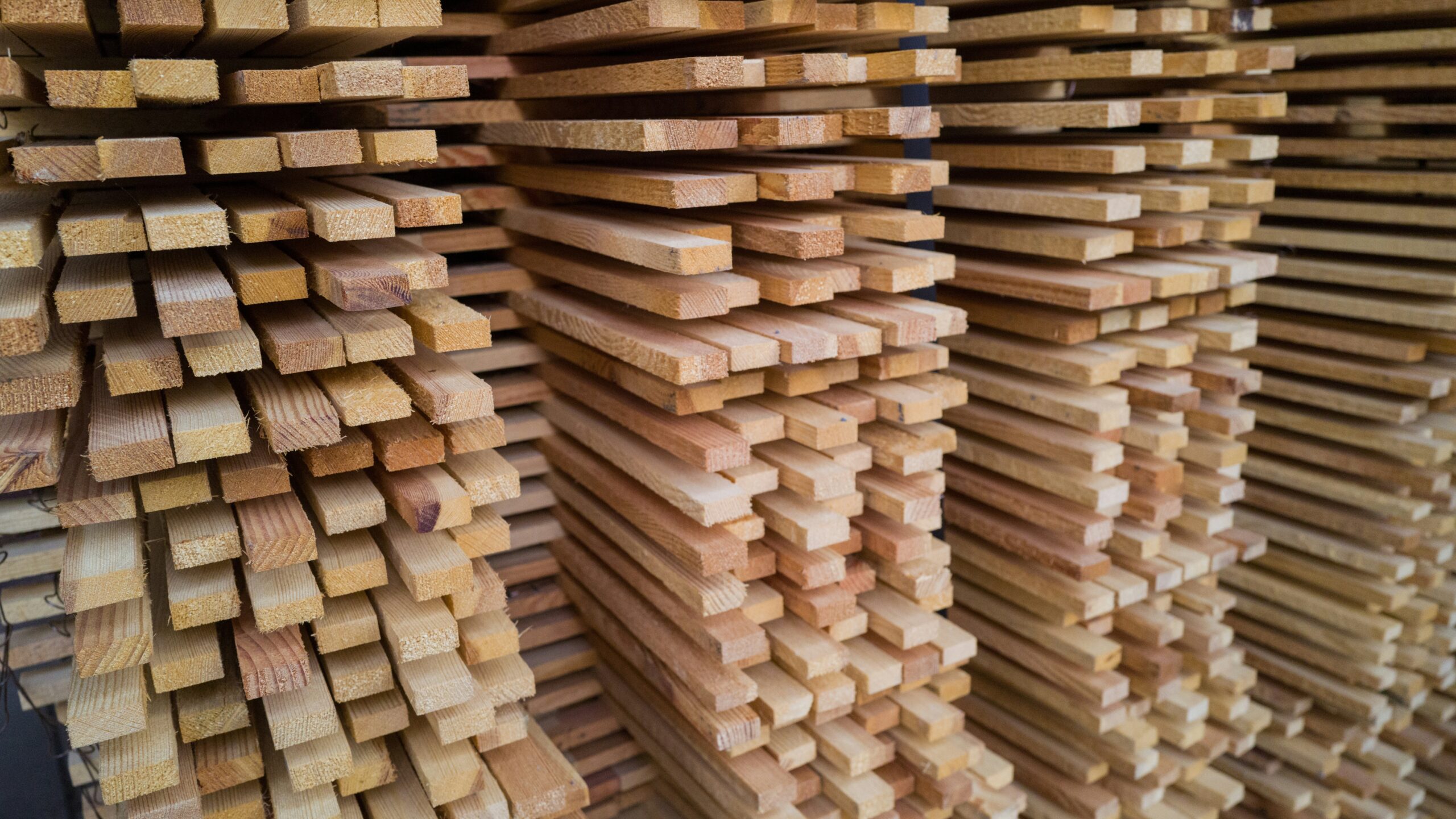 a stack of wooden planks stacked on top of each other
