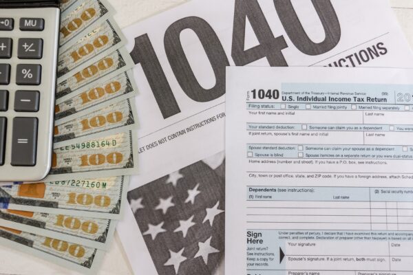 tax forms 1040 and dollars