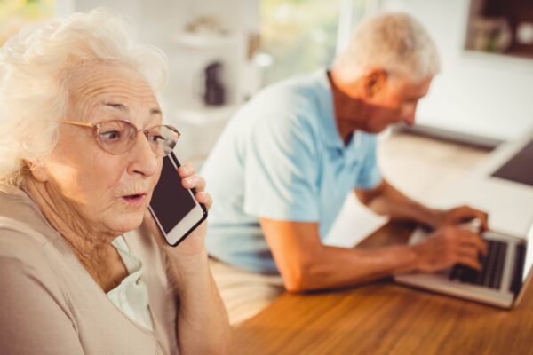 Senior woman on a phone call at home