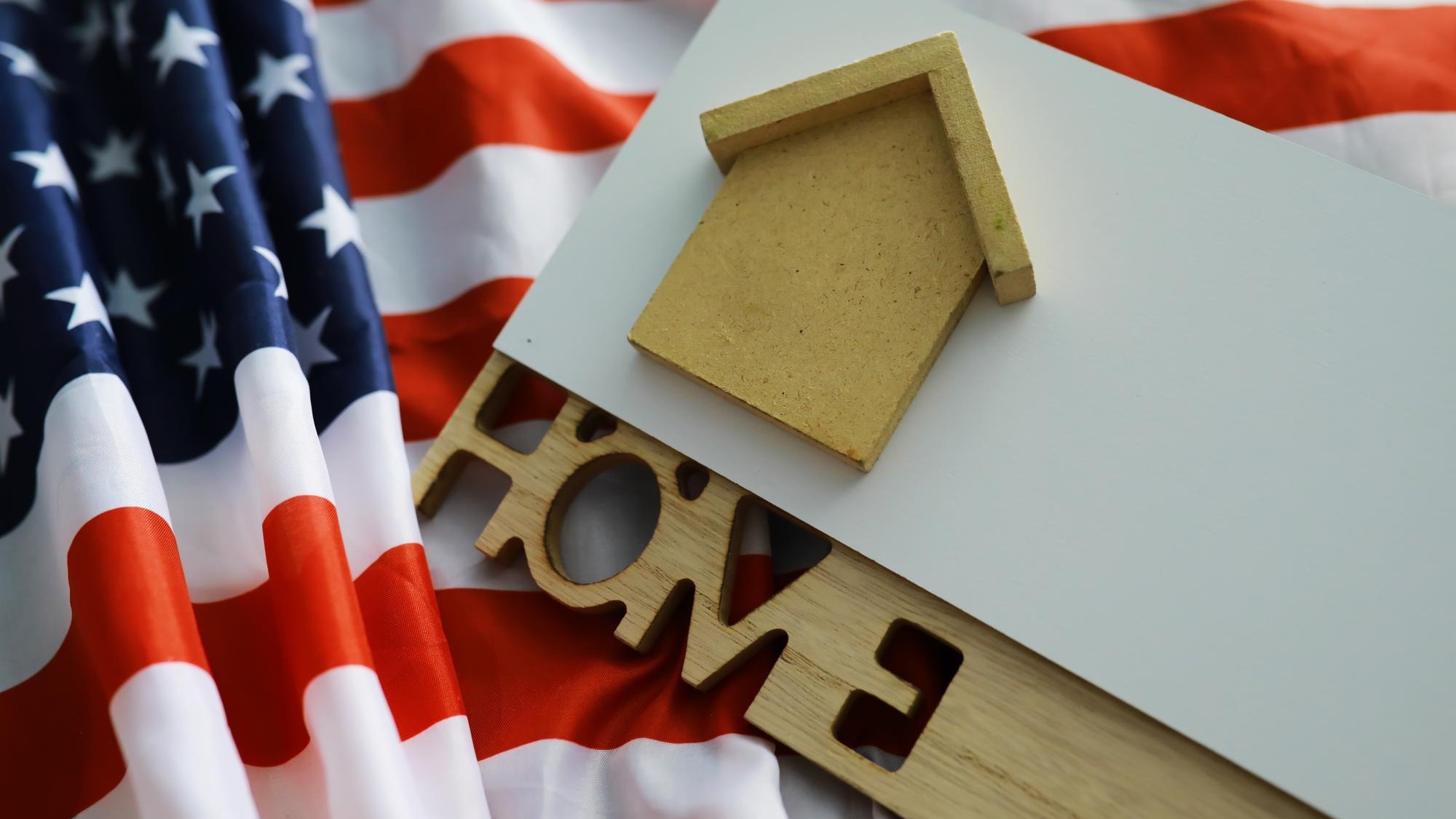 House symbol on the American flag Mortgage credit lending Housing safety