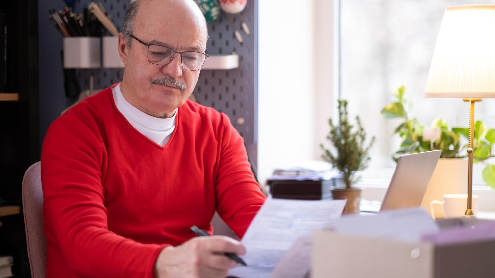Depressed senior man feel worry about financial problem.
