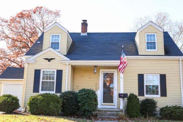 houses and american homes showing mortgage rates impact suburban homes symbolizing financial strain