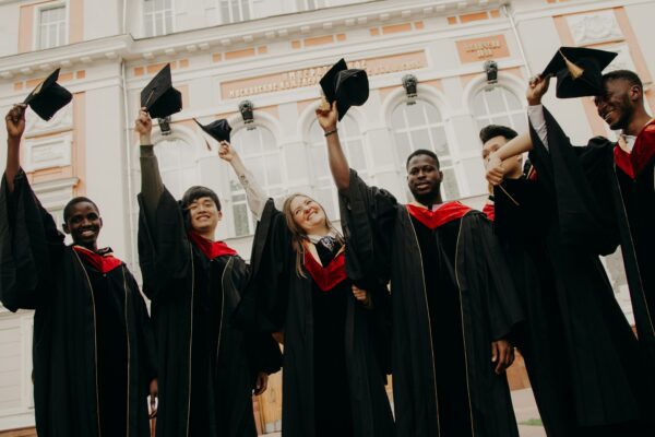 group of people wearing black academic dress